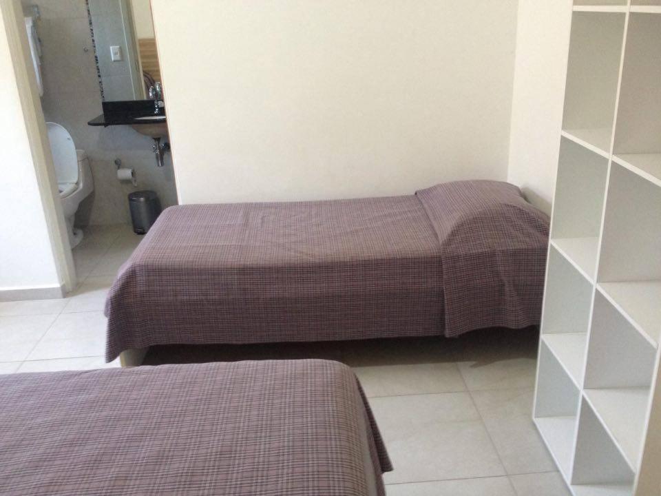 Pousada Parque Suites Estacionamento E Piscina Guarujá Szoba fotó